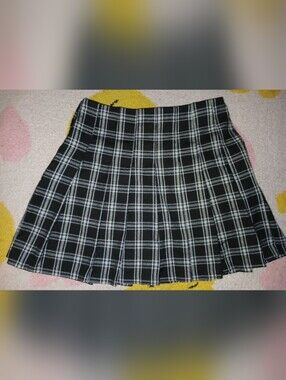 Pre-loved Girl's Black & White Plaid Pleated Mini Skirt.